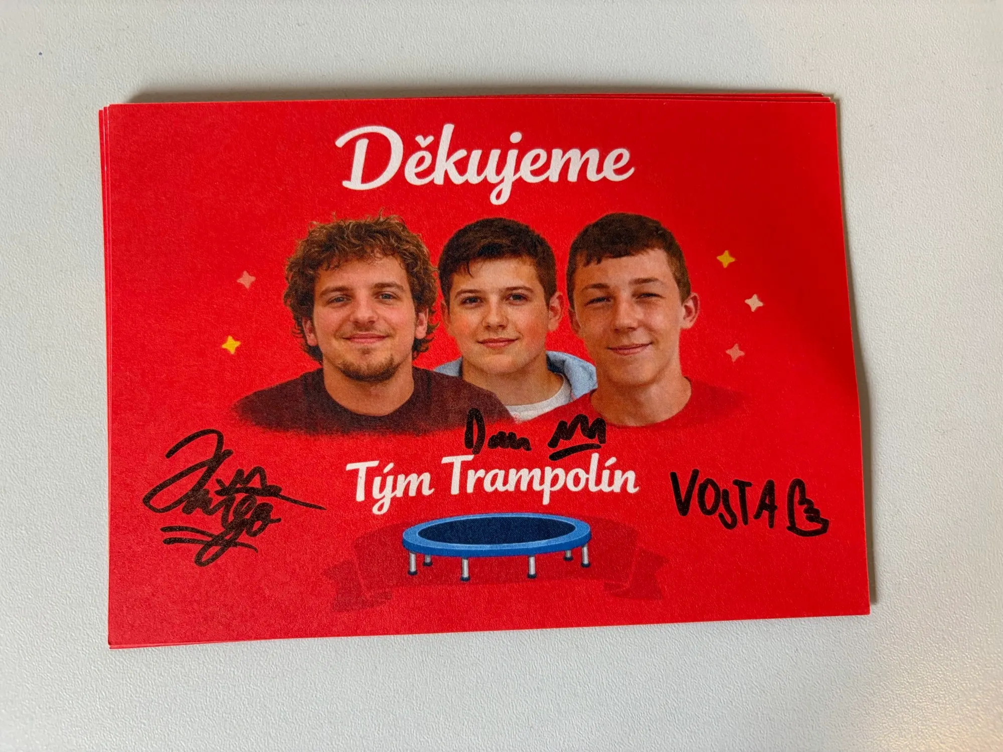 Front of a red Team Trampolin thank-you card